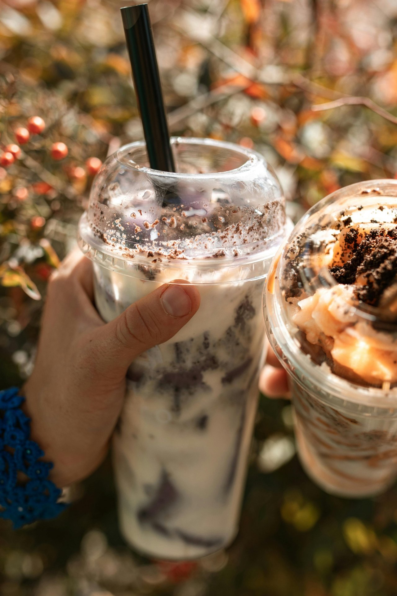 Barista preparing a fresh cup of bubble tea
