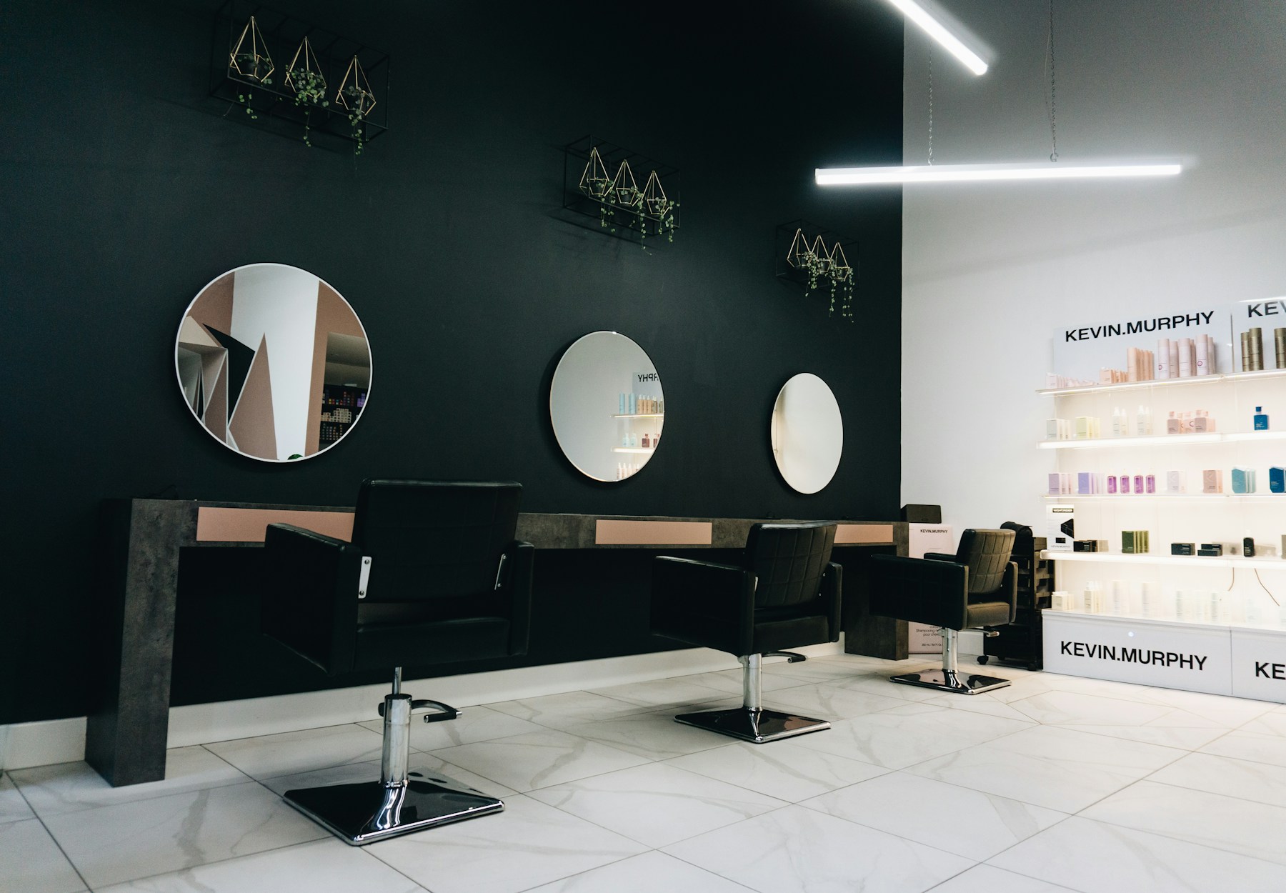Styling chairs and circular mirrors in the salon