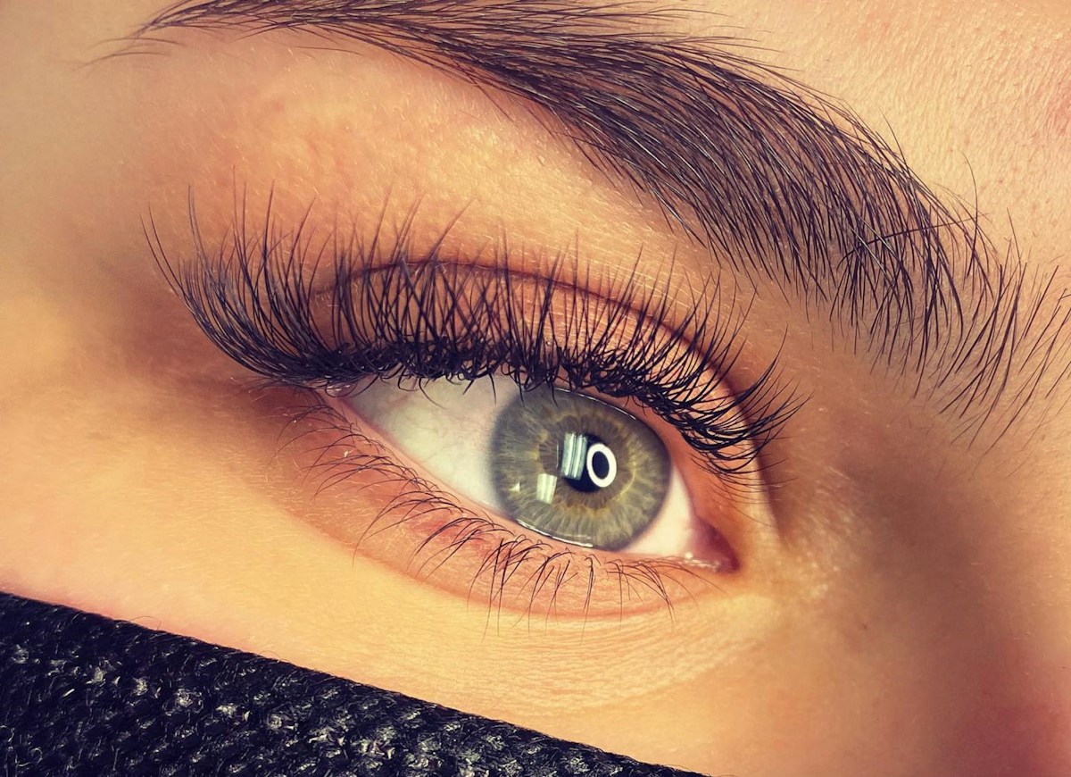 A close-up of naturally curled lashes