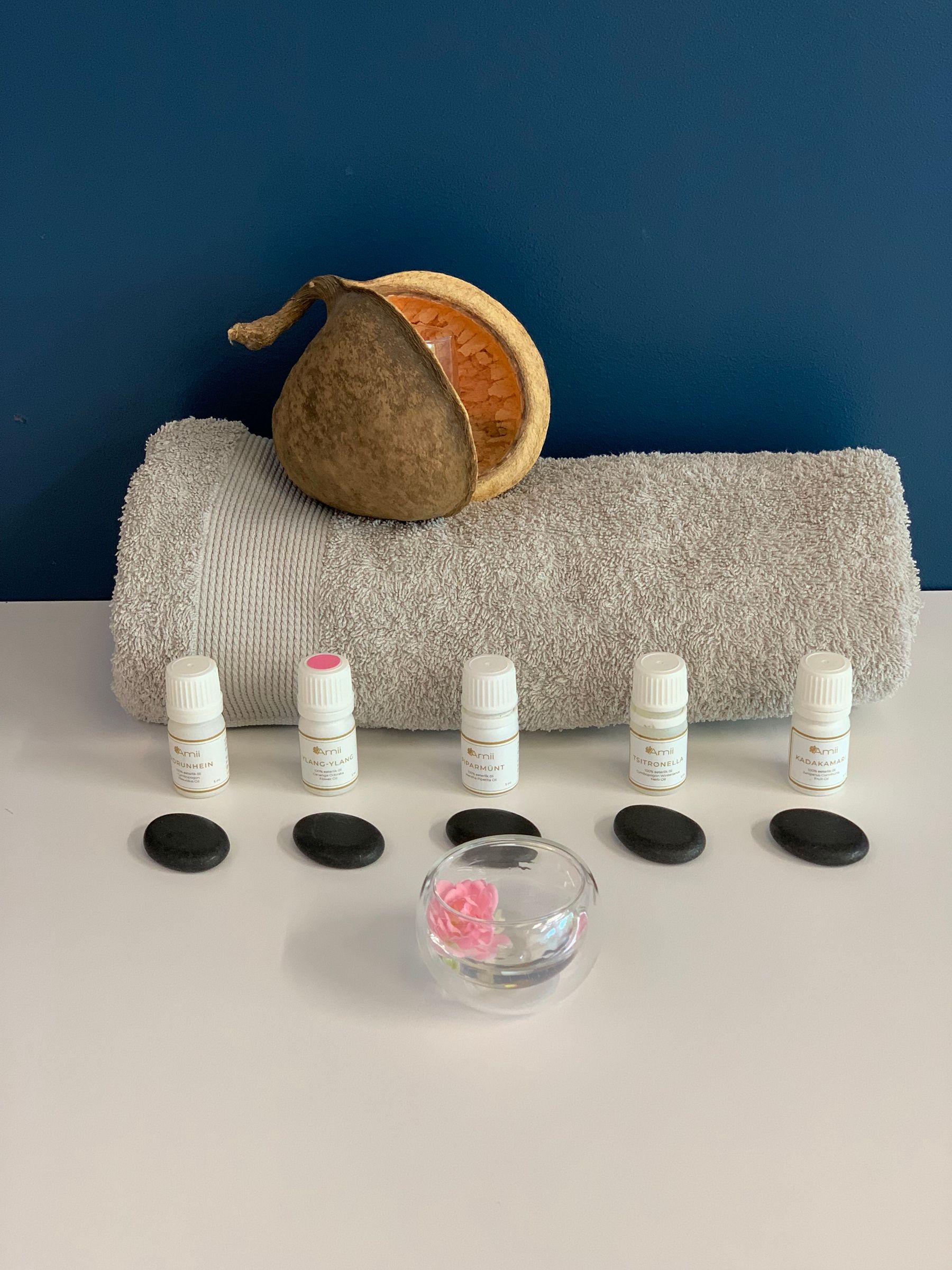 Thoughtfully arranged oils and linens