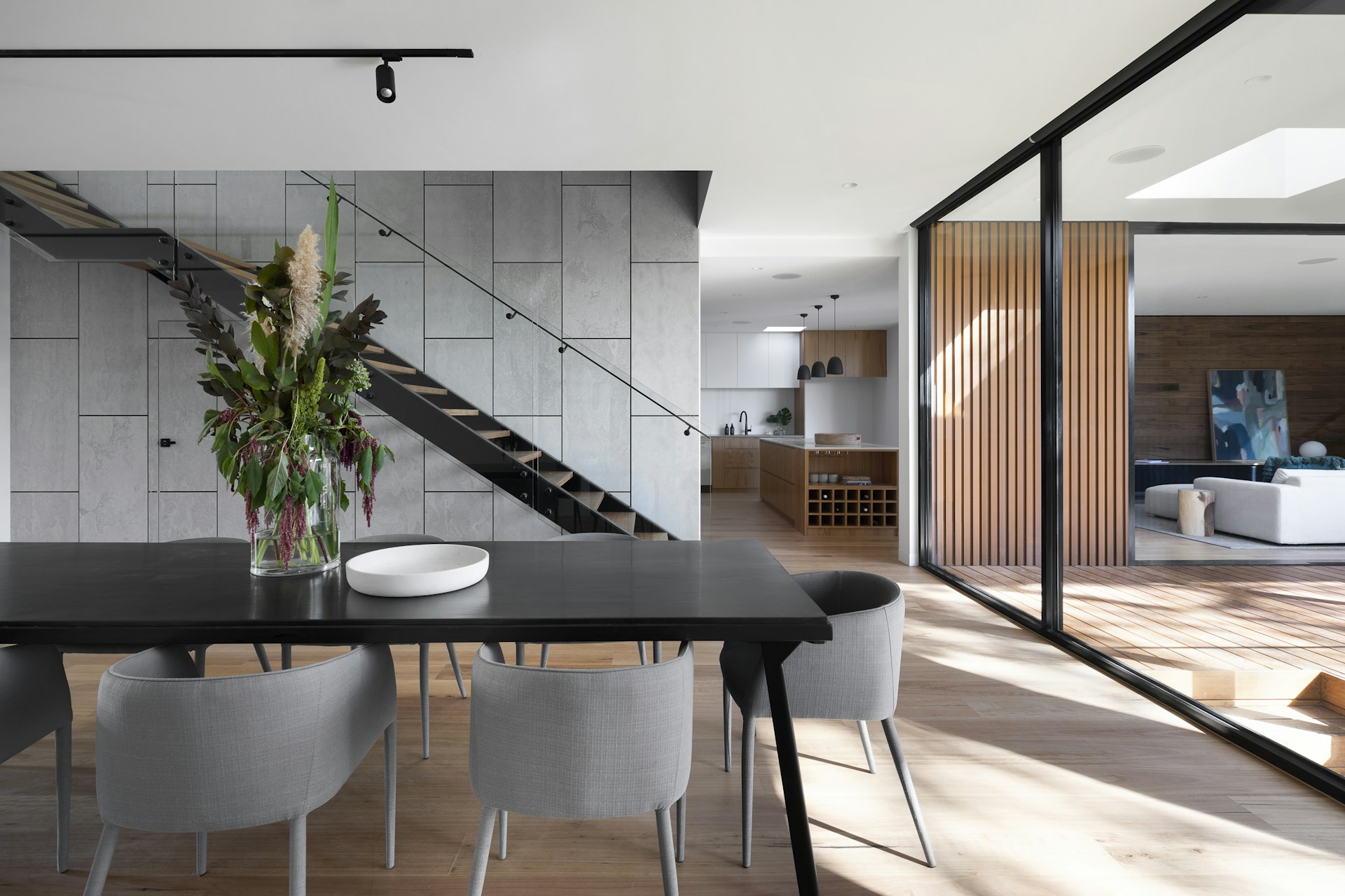 A quiet room with a tactile neutral palette and daylight