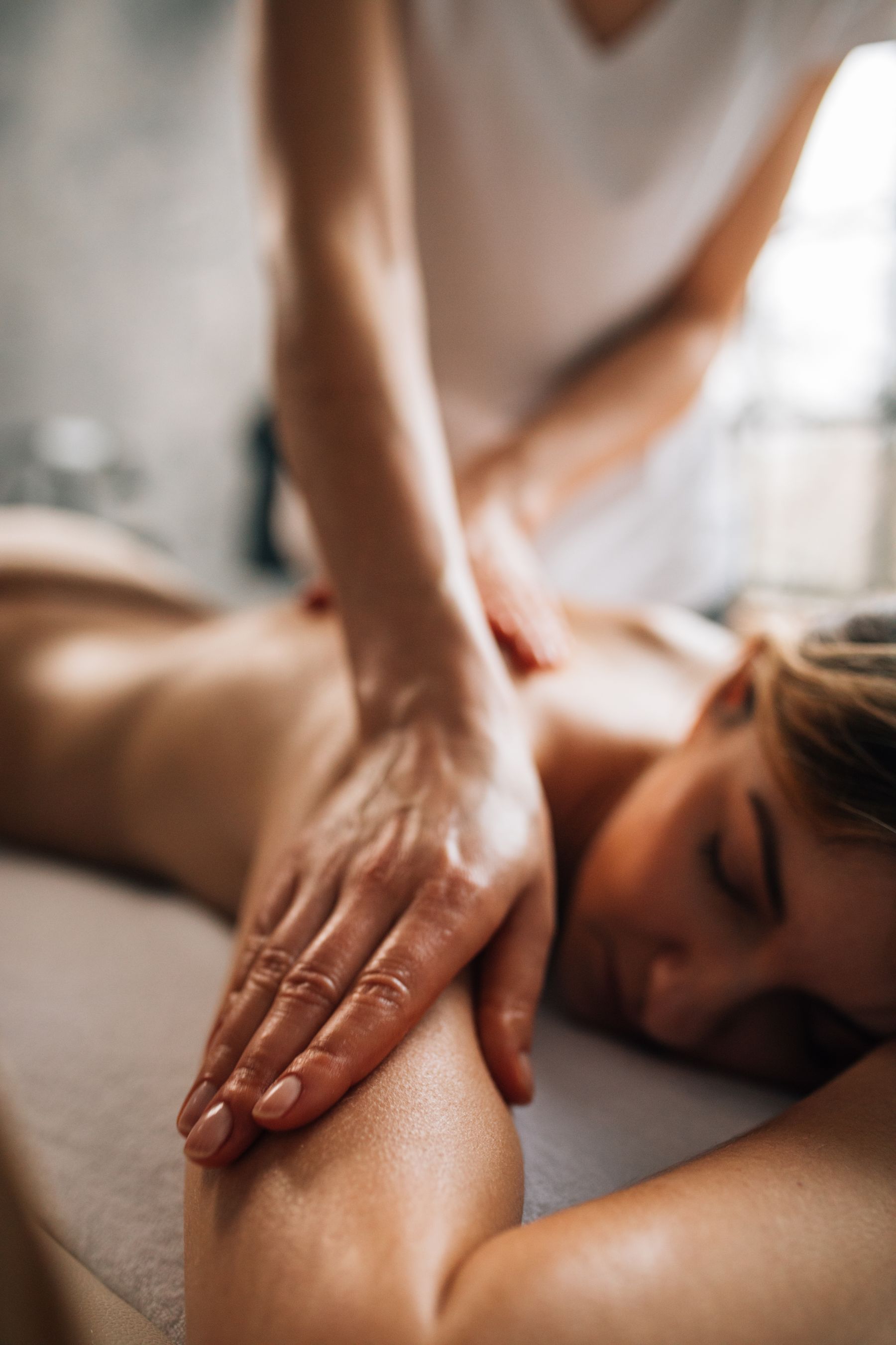 A close-up of a gentle massage ritual