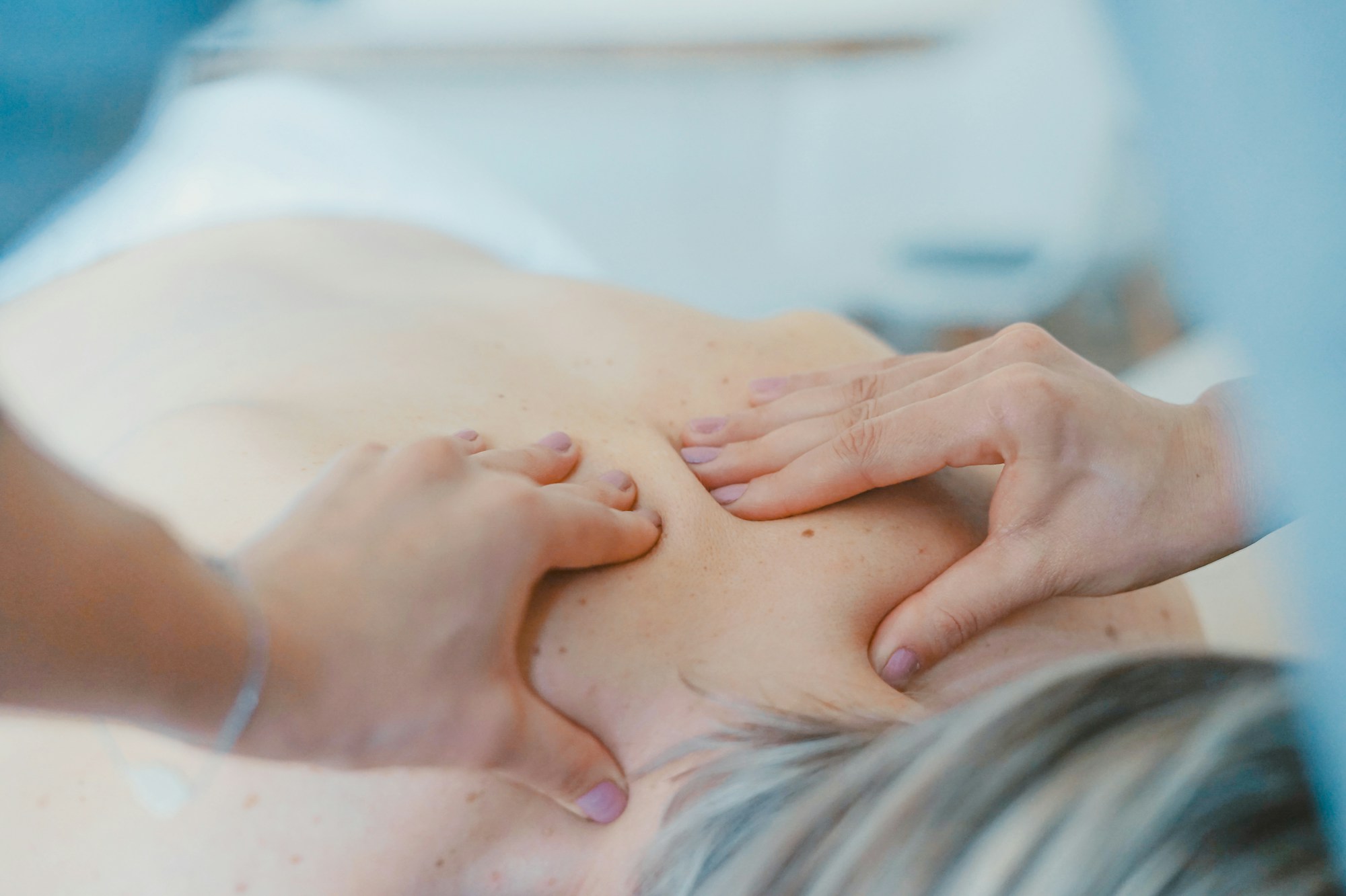 A calm massage ritual in a softly lit studio